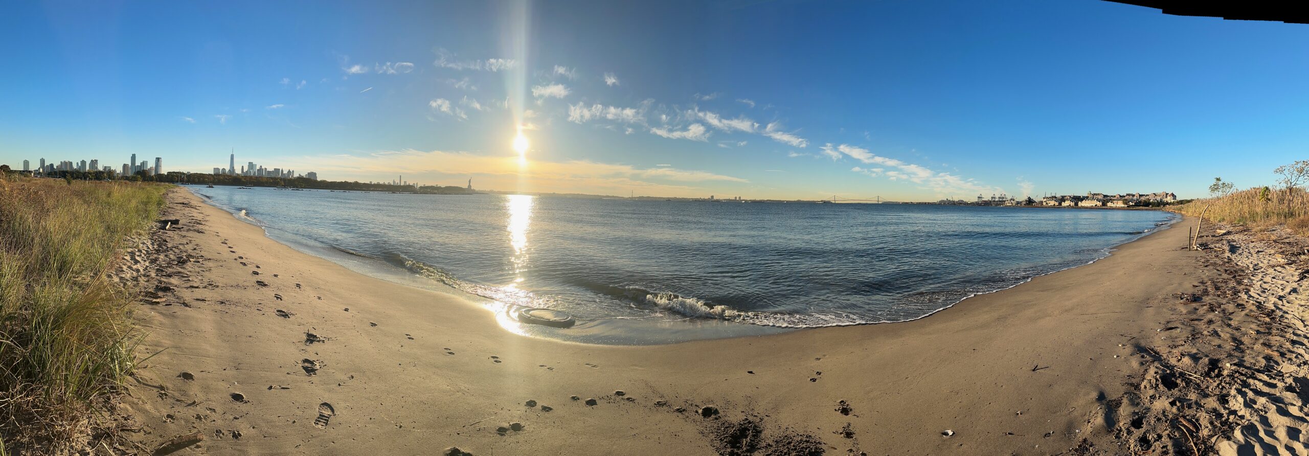A small sandy beach overlooking New York Harbor